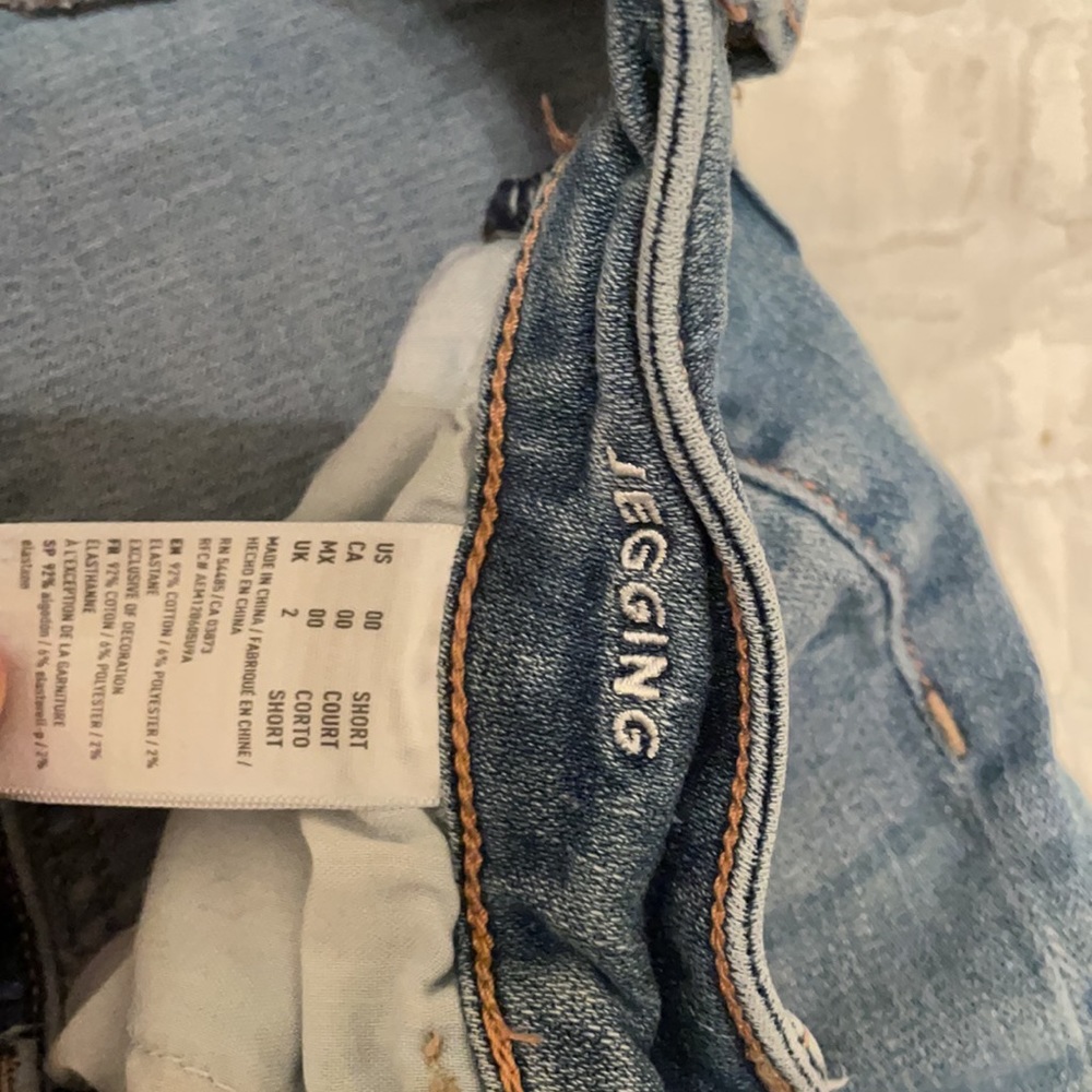 Medium Washed Distressed American Eagle Jeans - image 3
